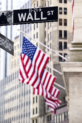 Analytici z Wall Street predikují vývoj akcií u společností General Motors, Wix.com a Netflix